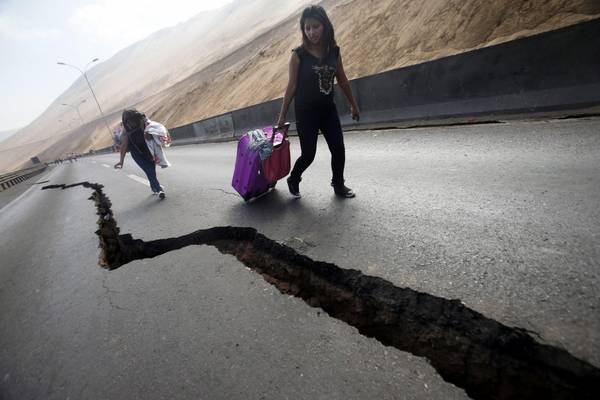 You absolutely should not run into the house, away from the street light poles or wires and at outdoor materials until the ground stops shaking. Photo: nbcnews.com