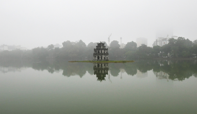 Turtle Tower The tower was built in 1886 and is located in the middle of Hoan Kiem Lake, in the center of Hanoi.  During the French colonial period, at the top of the tower there was also a bronze version of the Statue of Liberty, commonly known as the statue of the Lady, and was demolished in 1896. Later, the villagers of Ngu Xa melted down the statue. to get bronze to cast Buddha statues.  Hoan Kiem Lake also has many other names such as Luc Thuy, Ta Vong.