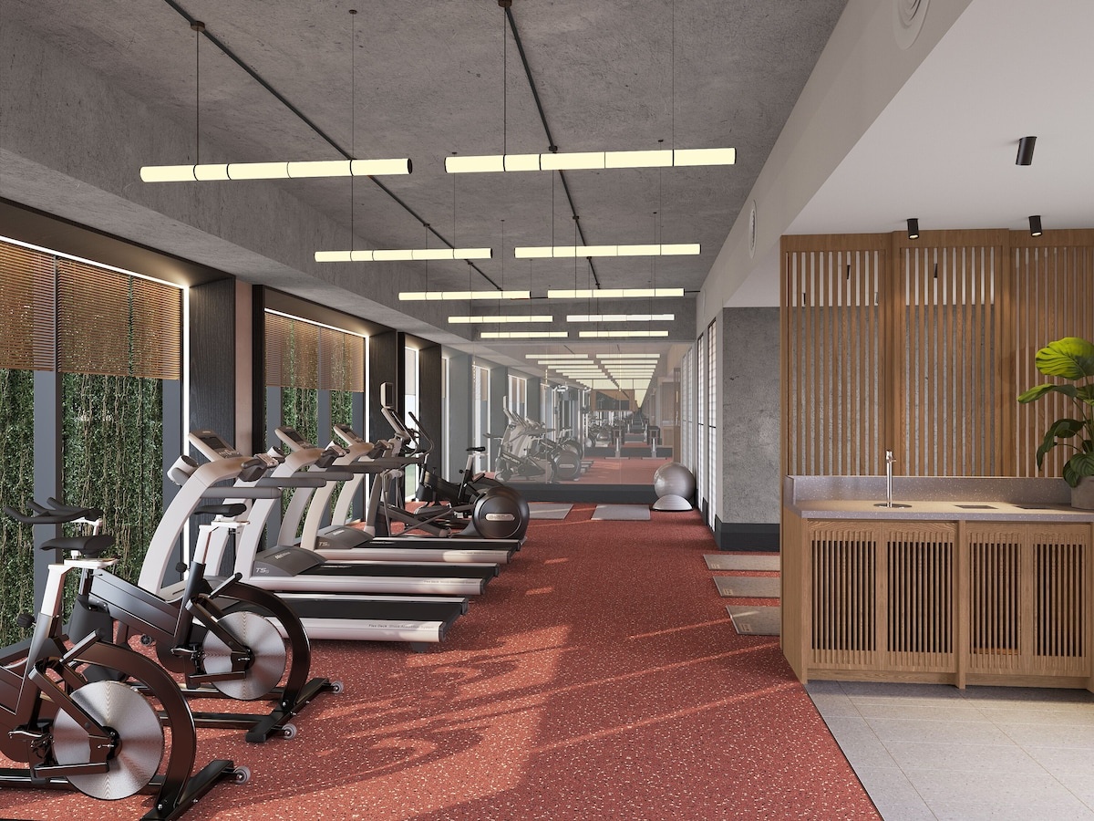 Phòng gym với máy tập hiện đại.